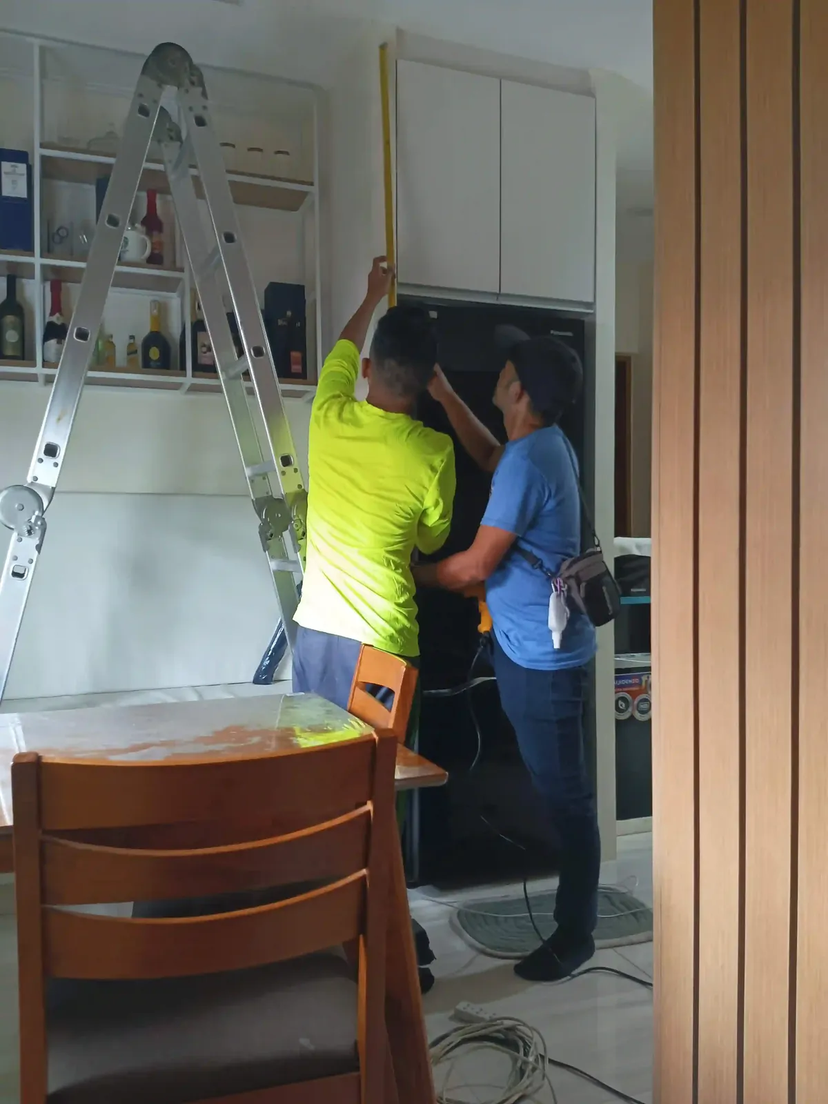 Powerbyte technicians on a job, mid-installation.