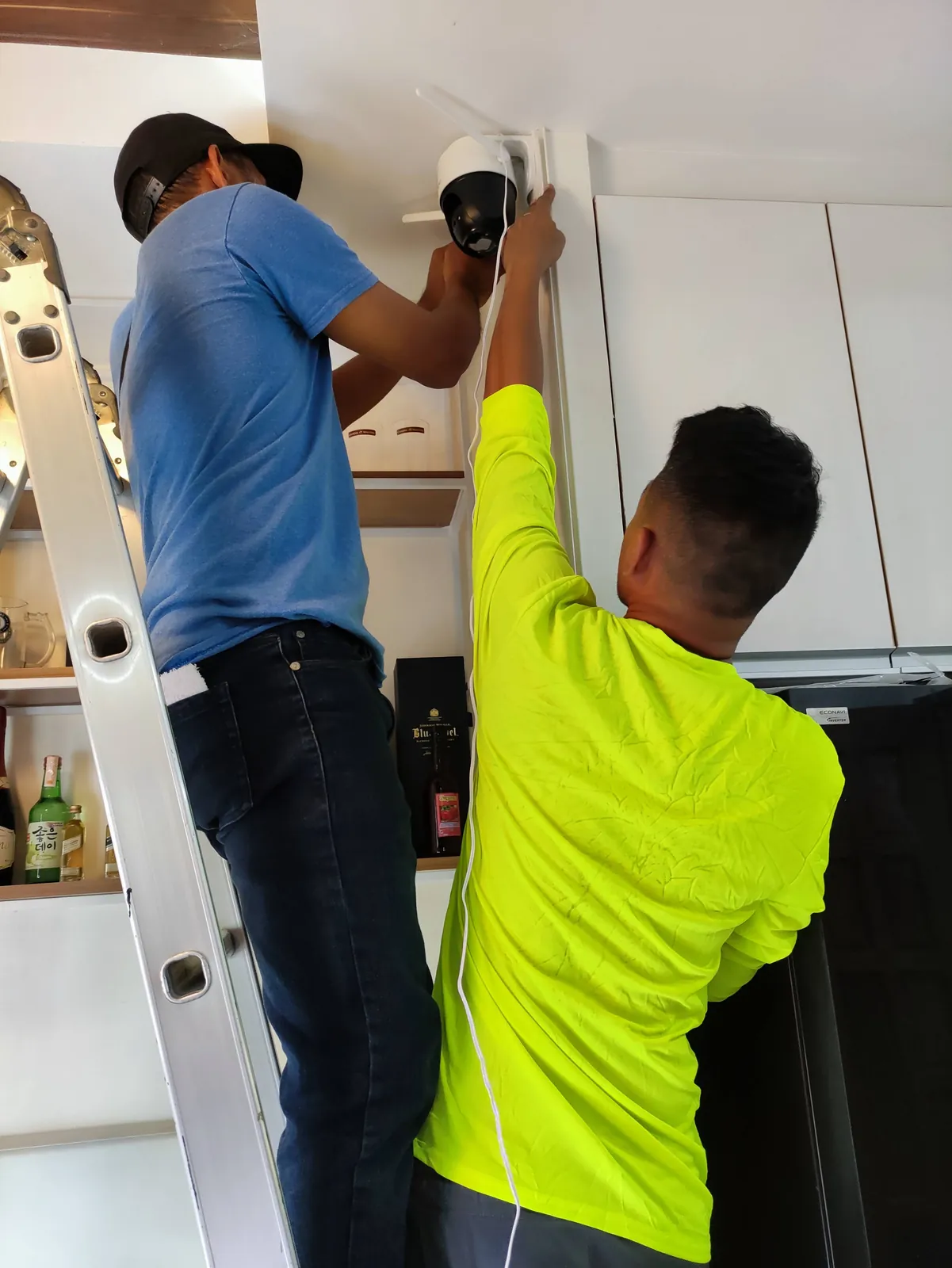 Powerbyte technicians on a job, mid-installation.