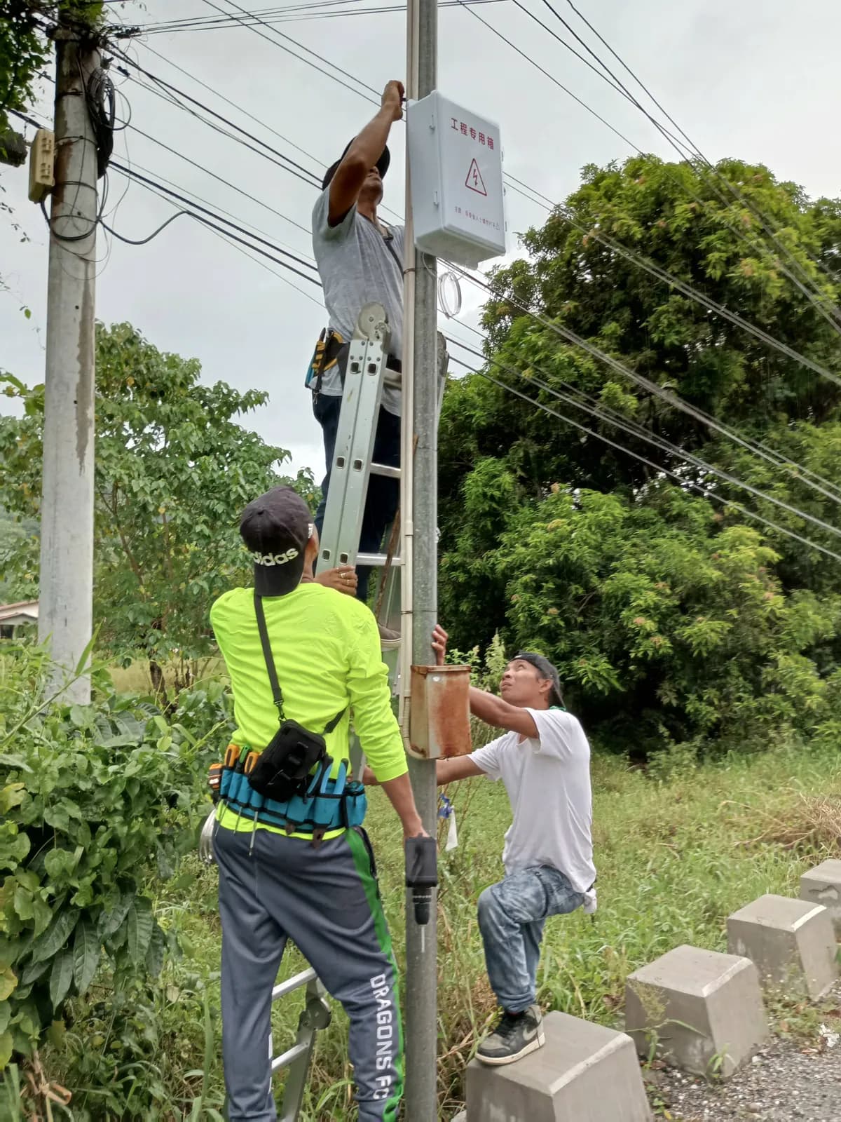 Candid on-site photo of the Powerbyte team at work.